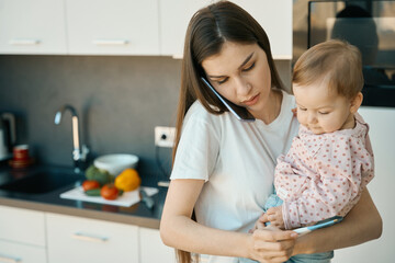 Worried woman holding a thermometer in her hands