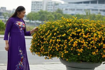 Vietnamese senior woman in the park in Vietnam.