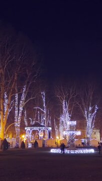 Christmas decoration, open air market, Zagreb, Croatia, vertical footage, social media festive cover