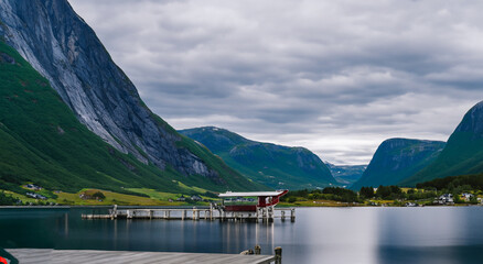 big mountains surrounding a beautiful lake in iceland