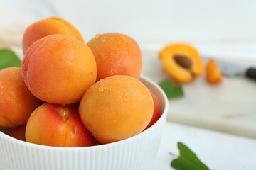 Bowl with fresh apricots, closeup