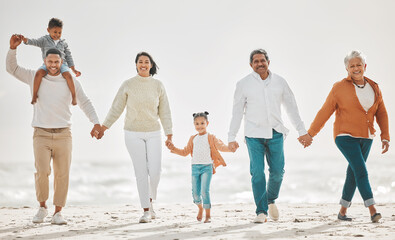Obraz premium Happy family, fun portrait and beach with grandparents, parent love and kids together by sea. Outdoor, vacation and children with grandmother and father by the ocean on holiday in group with a smile