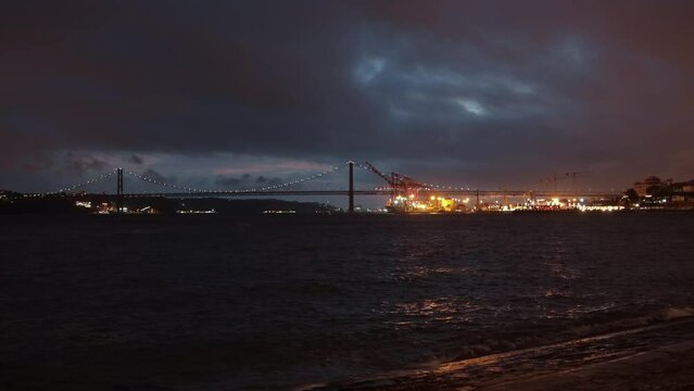 River Night Bridge and Port of Lisbon