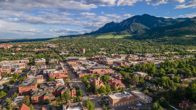 aerial shot of Boulder Colorado with Broadway street and flatirons mountain