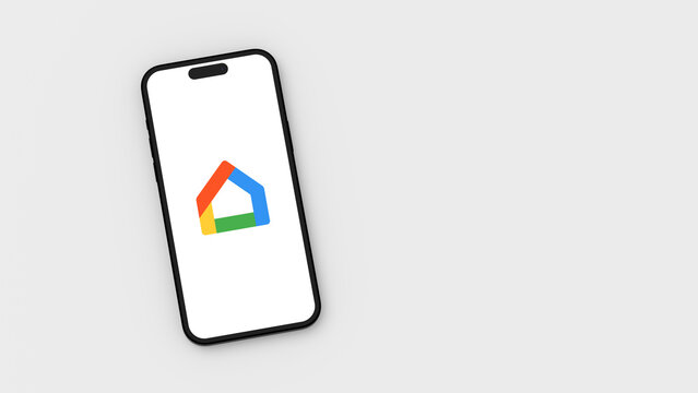 Google Home Logo on Mobile Phone Screen on Gray Background with Copy Space