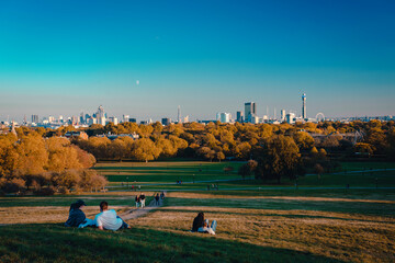 London's downtown panorama from Primrose Hill park at sunset in autumn