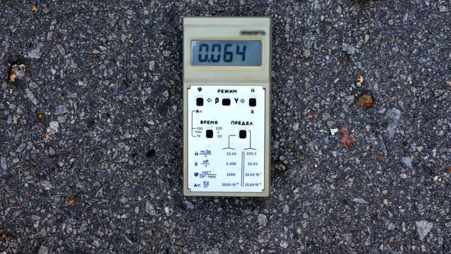 Soviet dosimeter shows an increased level of radiation. Footage from the closed zone around the Chernobol nuclear power plant.