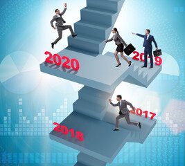 Businessman climbing stairs on yearly basis