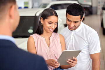 Tablet, car and shopping with couple and salesman for vehicle showroom, test drive and consulting. Auto, transportation and purchase with man and woman in dealership for insurance, sale and motor