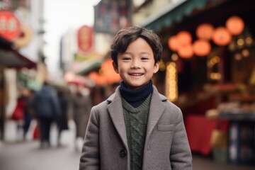 Portrait of a cute boy in a shopping street in Tokyo, Japan