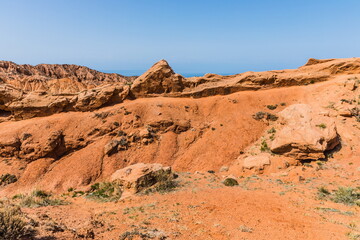 Fototapeta premium Skazka (Fairytale) Canyon - the most unusual and picturesque gorge on the southern shore of Issyk-Kul, the main attraction in the vicinity of the lake, Kyrgyzstan