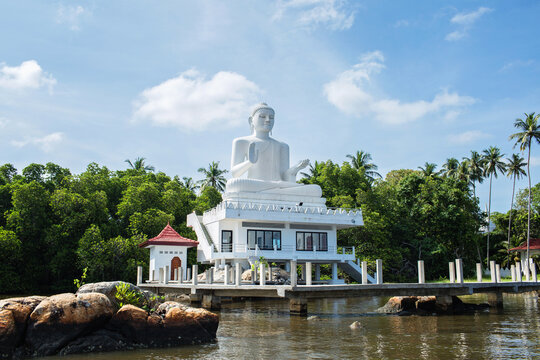 Bentota, Sri Lanka - April 15, 2018: state of white sitting Buddha