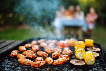 Assorted delicious grilled meat with barbecue grilled vegetables.  Сoncept of lifestyle, holidays,...