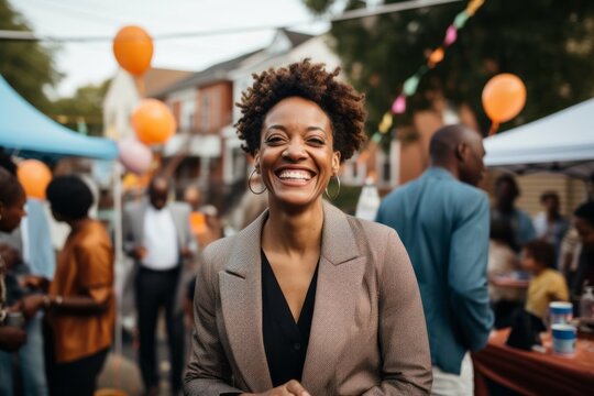 Medium shot portrait photography of a grinning woman in her 40s that is wearing a sleek suit against a neighborhood block party with food and games background . Generative AI