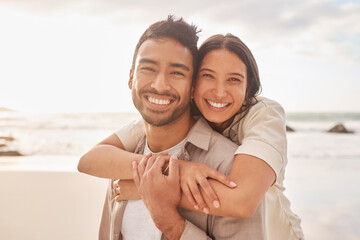 Portrait, hug and couple at the beach with happiness for a vacation in the summer having fun....