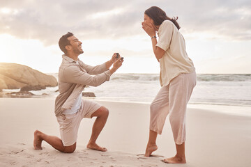 Couple, engagement proposal and surprise at beach with smile, happiness or love on vacation in sunset. Man, woman and ring with marriage offer by ocean with smile, excited face or together on holiday - obrazy, fototapety, plakaty