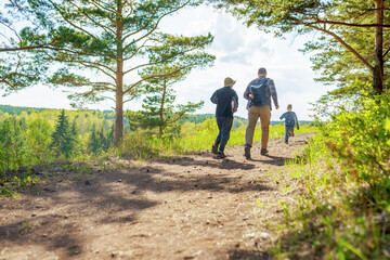 family hiking in the countryside