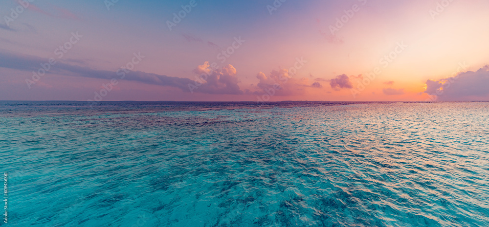 Wall mural calm sea with sunset sky and sun through the clouds over. meditation ocean and sky background. tranq - Wall murals