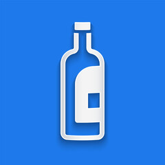 Paper cut Bottle of wine icon isolated on blue background. Paper art style. Vector