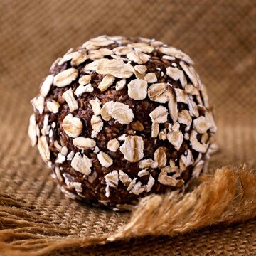 Chocolate Brownie Oat Energy Ball On Burlap