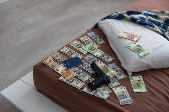 wallet with money out of a murder evidence bag, conceptual image