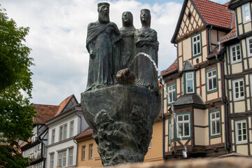Obraz premium Heinrich I. and Wife Mathilde and grandchild Mathilde Monument of well-known personalities from Quedlinburg (Persönlichkeiten der Quedlinburger Geschichte) Quedlinburg Saxony-Anhalt Germany