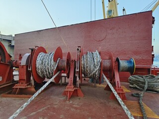 Mooring ropes in winch on a cargo ship
