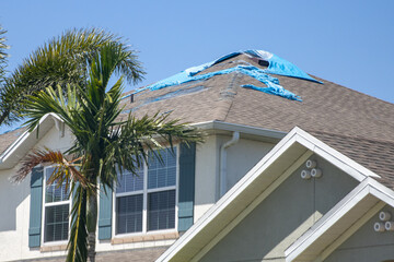 Destroyed Tarp on the roof
