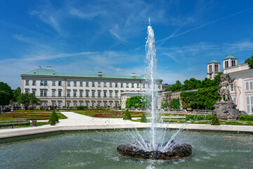 Fountain in the Beautiful Mirabell palace in Salzburg Austria with rose garden and statues