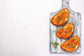 Blank food photography of toast with smoked salmon, cream cheese, cress salad, breakfast, sandwich, bruschetta, fillet, slice, seafood