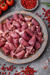 Raw chicken or turkey hearts with salt, spices and herbs