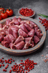 Raw chicken or turkey hearts with salt, spices and herbs