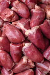 Raw chicken or turkey hearts with salt, spices and herbs