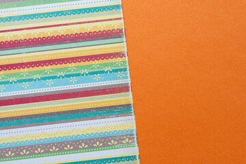 colorful scrapbook paper with striped pattern and texture
