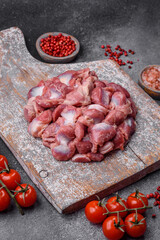 Raw chicken or turkey gizzards with salt, spices and herbs