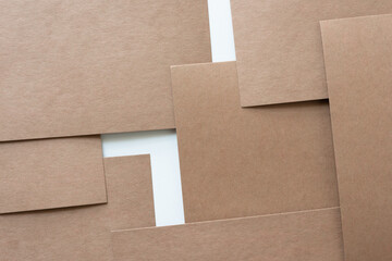 partly layered plain brown paper card background with minimalist aesthetic
