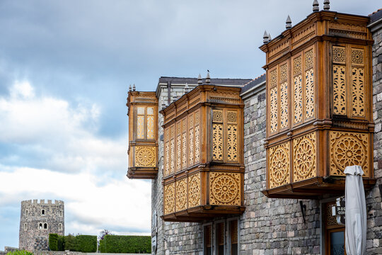 Traditional wooden Georgian carved balconies a courtyard of Akhaltsikhe Castle, Georgia.