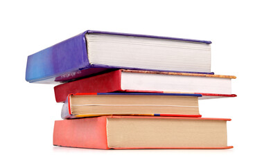 Stack of old books isolated on white background.