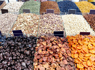 dried fruits and nuts on the market counter