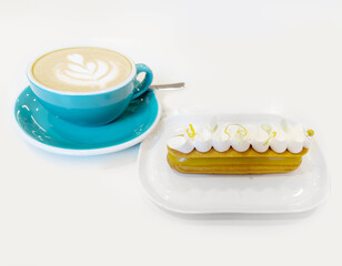 cappuccino and cake on the table in the restaurant