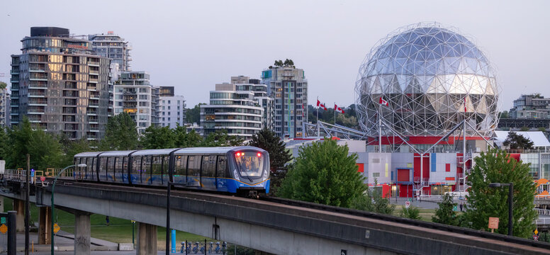 Skytrain riding by Science World during Sunn Sunset.
