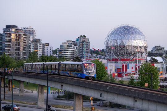 Skytrain riding by Science World during Sunn Sunset.