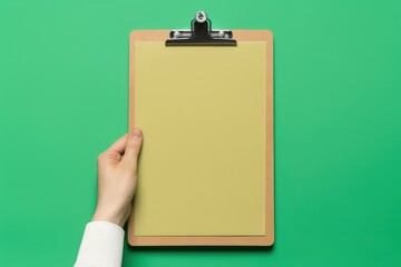 Hand holding clipboard isolated on green background, Generative AI
