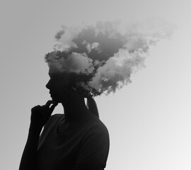 Thoughtful woman with mist and clouds in head symbolizing amnesia on grey background - obrazy, fototapety, plakaty