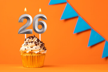Candle number 26 - Cake birthday in orange background