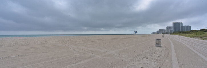 Deserted sand beach at Mimai during cloudy winter day 