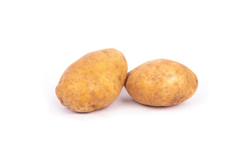 fresh potatoes are on white surface