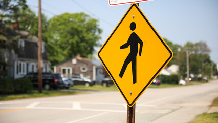 Pedestrian sign: a symbol of pedestrian safety, crosswalks, caution, and the importance of sharing...