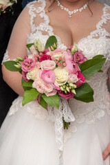 the bride with a bouquet of flowers