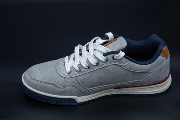 new gray  sneakers sport shoe , stitching detail on sport shoes
